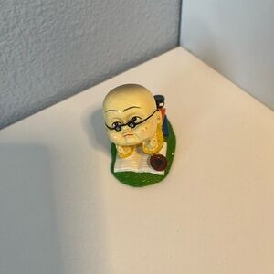 Kitschy Asian Monk Figurine Risen